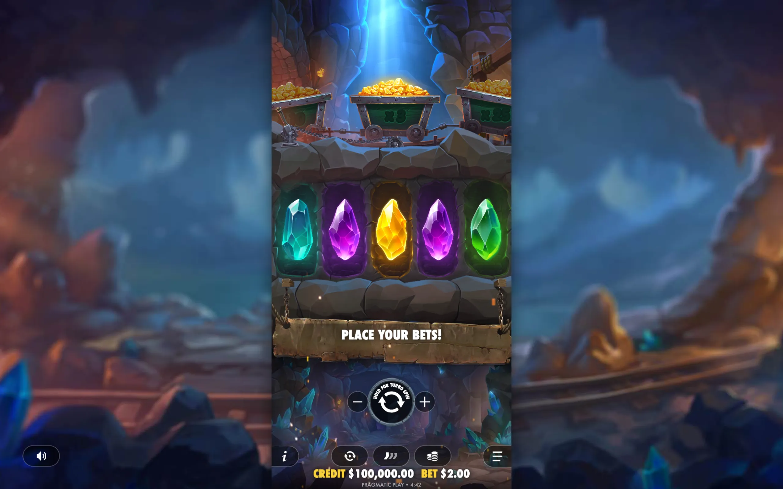 A mystical cave setting with colorful glowing gems and mining carts filled with gold, inviting players to place bets.