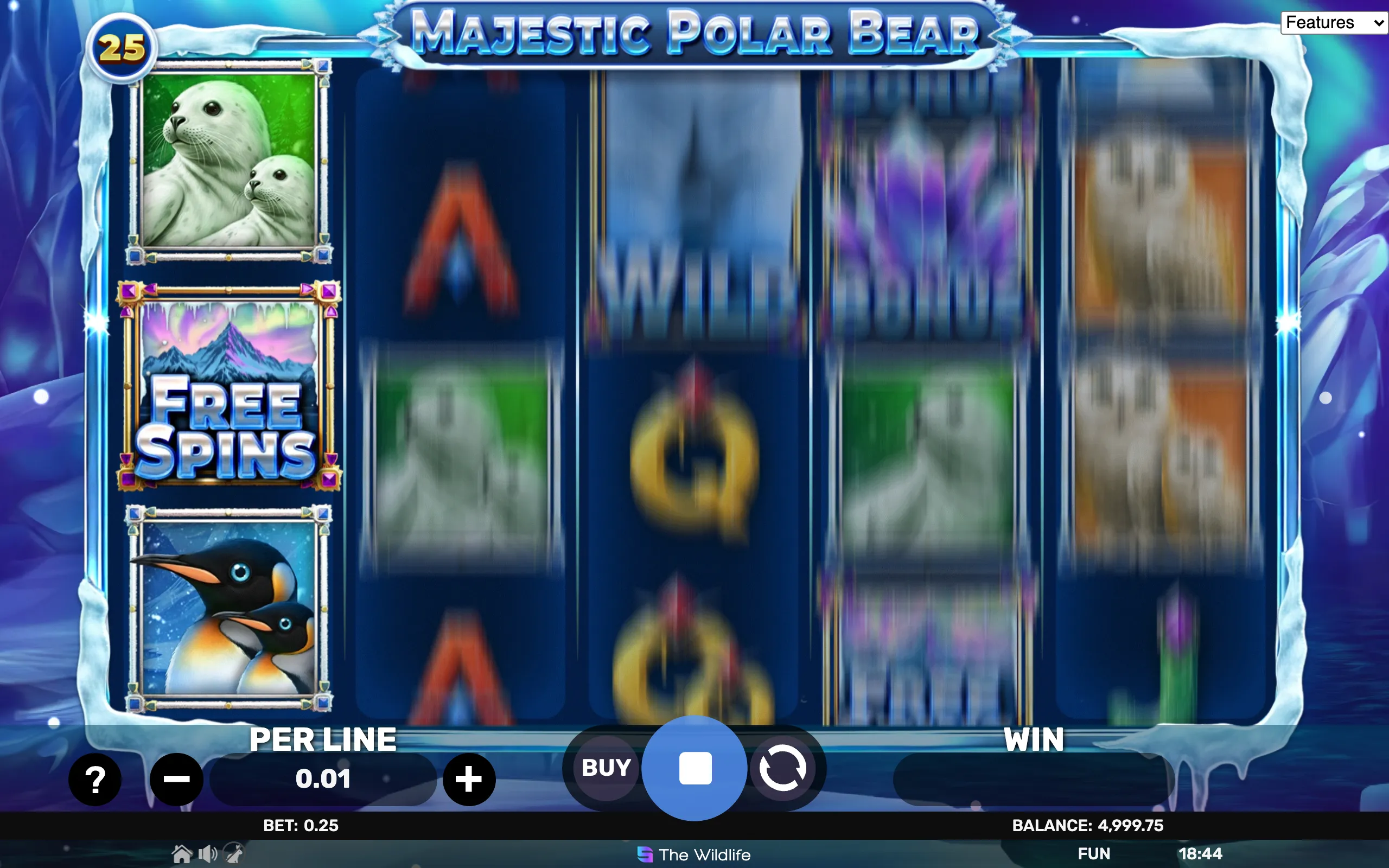 Majestic Polar Bear slot game with icy blue theme, featuring symbols of polar bears, seals, penguins, and a free spins bonus symbol with northern lights and mountains.