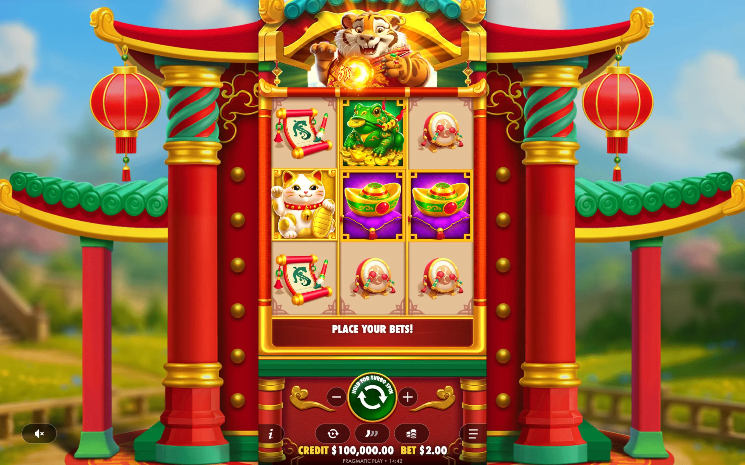 A colorful Asian-inspired slot game interface featuring a cheerful tiger holding a glowing orb with a 5x multiplier, surrounded by symbols like a lucky cat, golden ingots, a frog, scrolls, and drums.