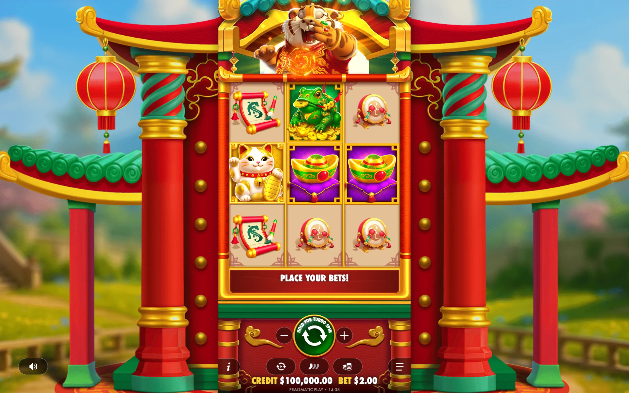 A colorful Asian-themed slot game interface featuring a joyful tiger character, lucky symbols like a frog on gold coins, a waving cat, gold ingots, and traditional drums within a pagoda-style frame.