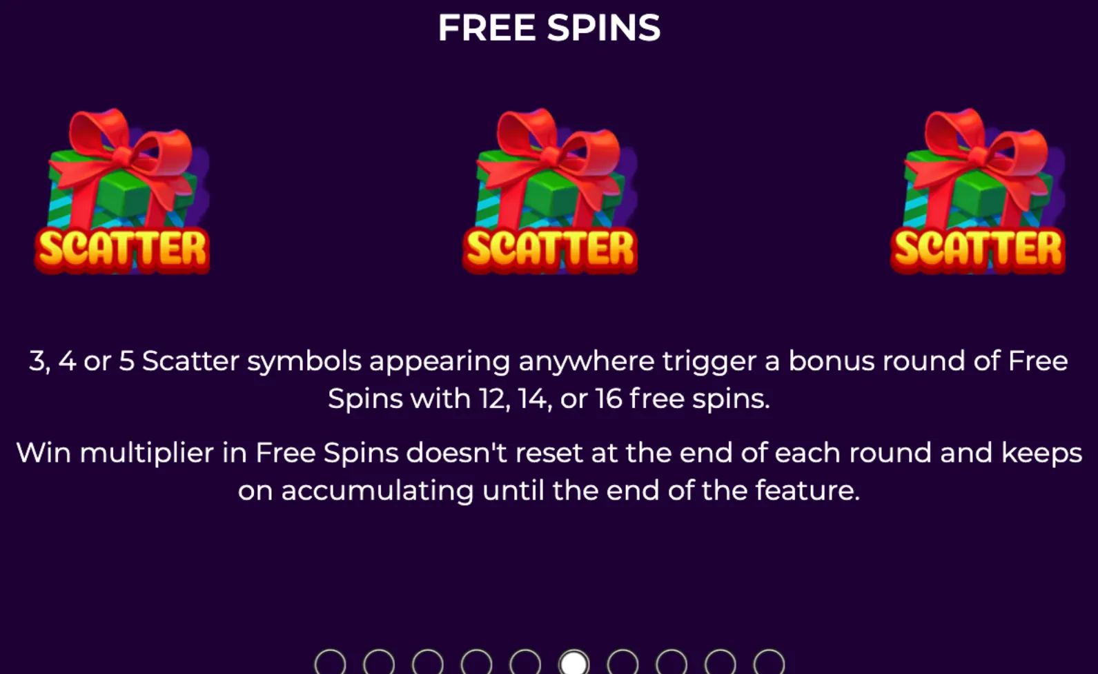 Three green gift box scatter symbols with red ribbons indicating the free spins bonus feature in Jingle Blast slot game.