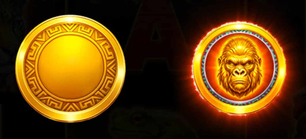 Two golden circular coins with intricate designs, one featuring a fierce gorilla face glowing with an orange aura, set against a dark background.