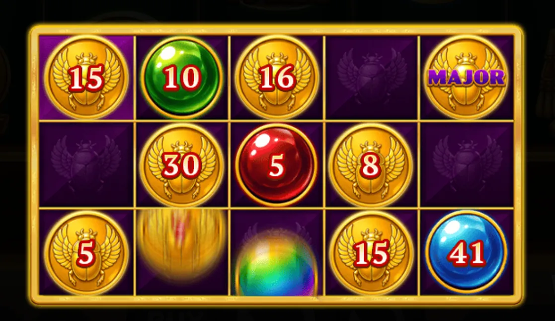 A slot game grid featuring golden scarab coins with red payout numbers, colorful orbs, and a major jackpot symbol on a purple background.
