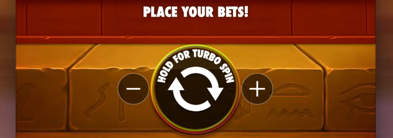 A betting interface with Egyptian-themed stone blocks and a central spin button labeled 'Hold for Turbo Spin' surrounded by plus and minus buttons for adjusting bets.