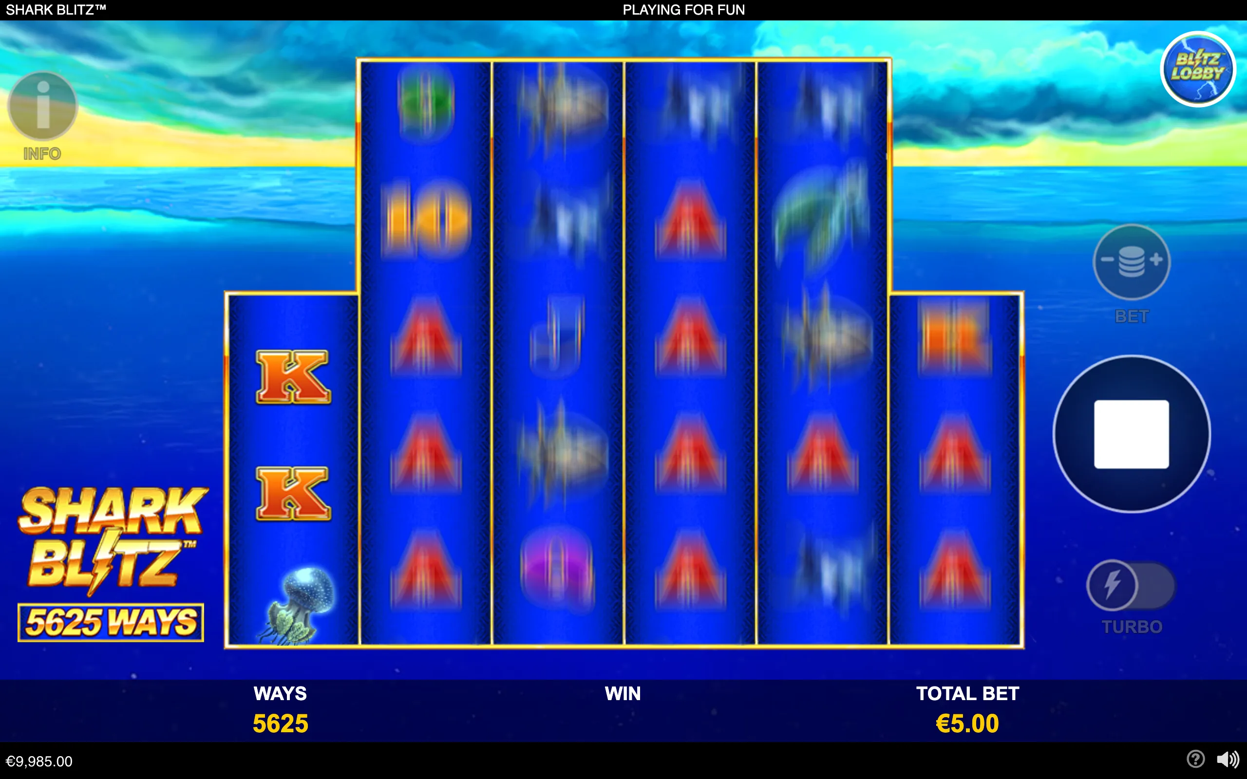 Shark Blitz slot game interface with spinning blue reels, ocean and sky backdrop, golden K symbols, colorful card-style symbols, and a 5,625 ways label.