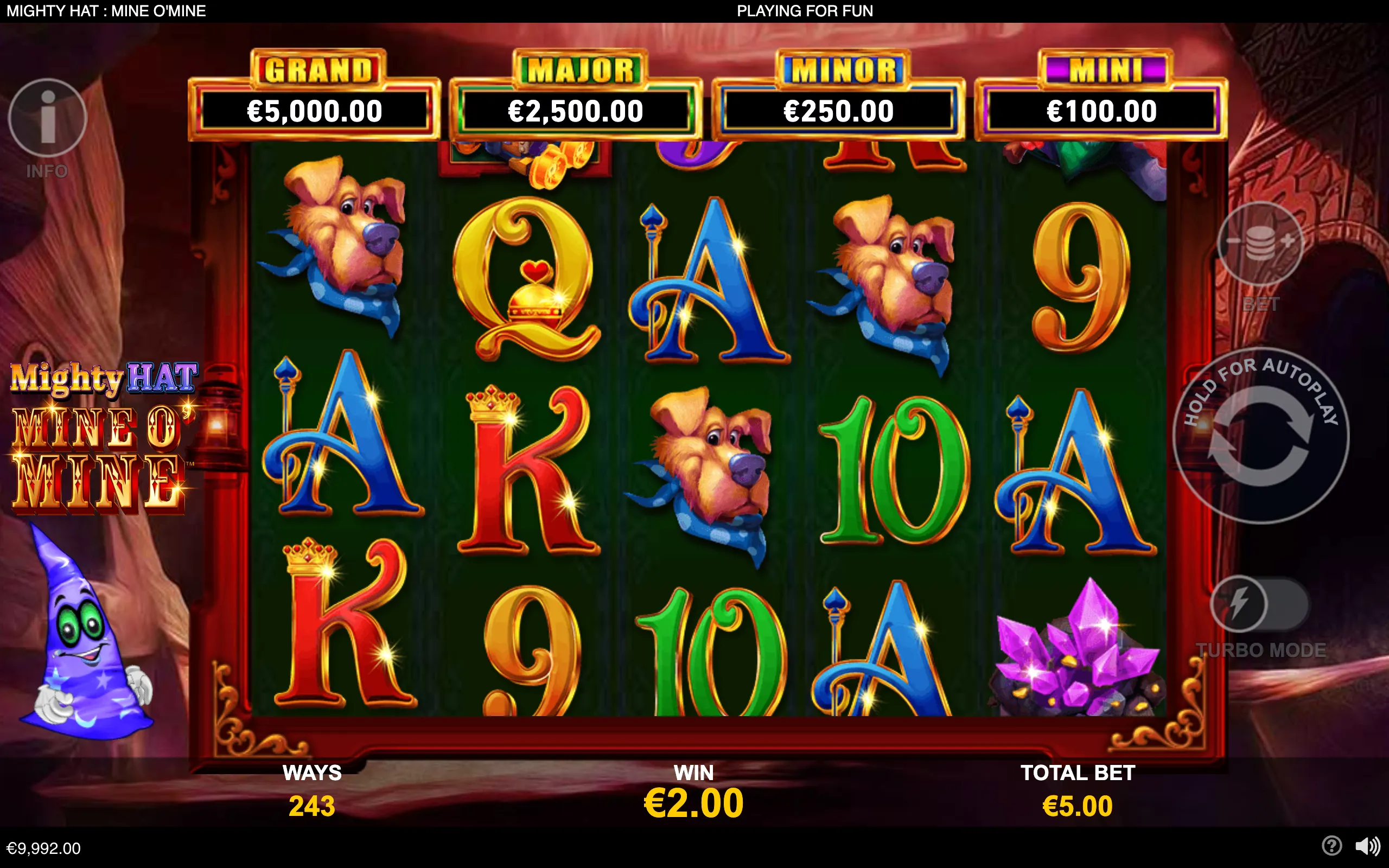 Mighty Hat Mine O'Mine slot reels with cartoon dog symbols, colorful playing-card letters, purple gemstones, and Grand, Major, Minor, and Mini jackpot amounts.
