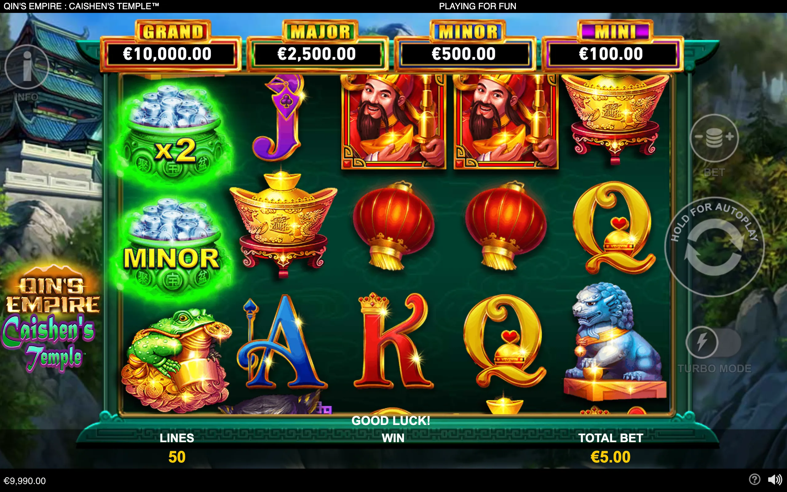 Qin's Empire: Caishen's Temple slot interface with Chinese temple scenery, jackpot values, a fortune deity, gold ingots, red lanterns, a money frog, and a guardian lion.
