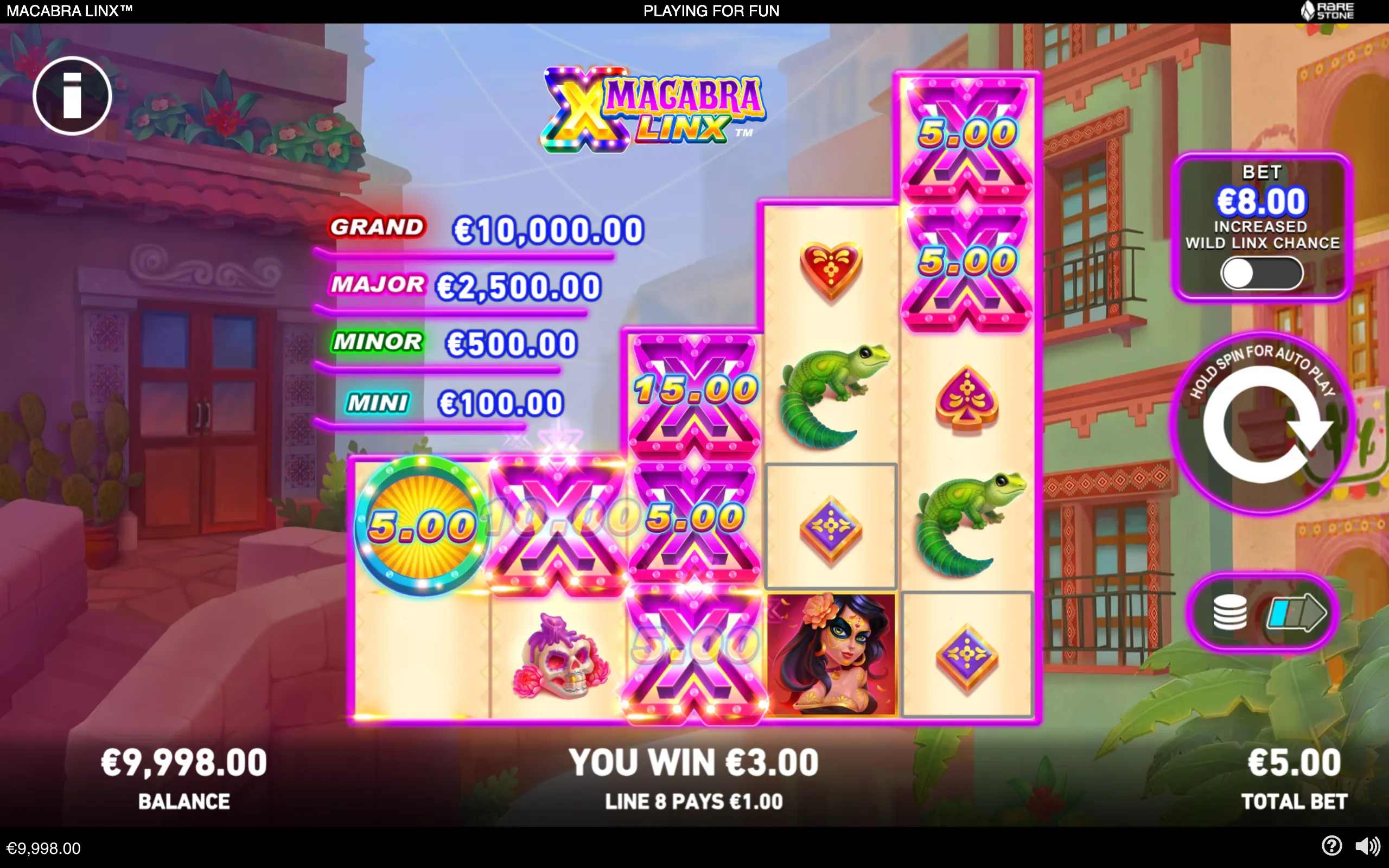 Colorful Macabra Linx slot interface featuring a Mexican-style courtyard, glowing multiplier symbols, green lizards, a sugar skull, and a masked woman beside jackpot values.