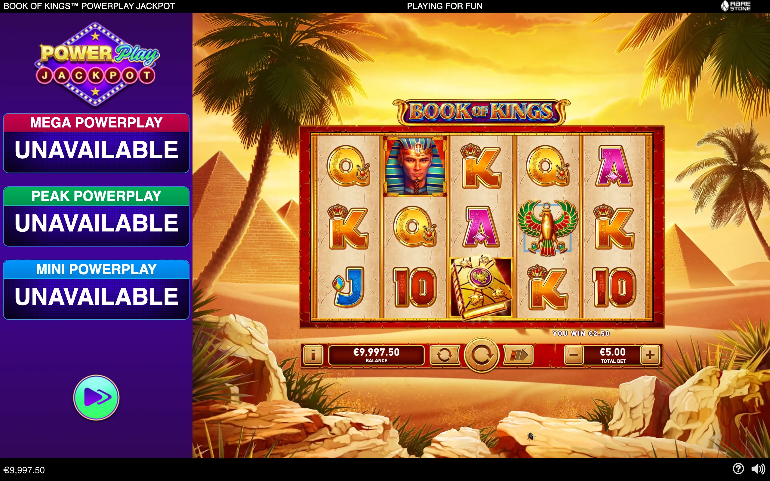 Book of Kings PowerPlay Jackpot slot interface with Egyptian symbols, a pharaoh, scarab-themed book, pyramids, palm trees, and a displayed €2.50 win.