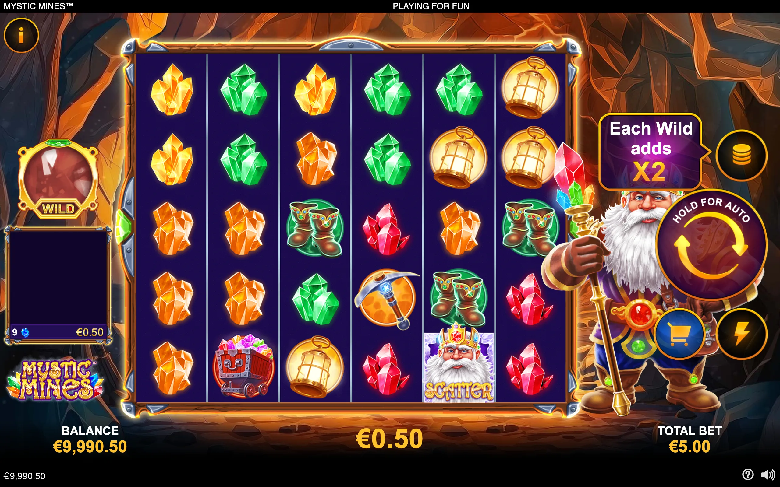 Mystic Mines slot interface featuring glowing orange, green, and red crystals, mining equipment, treasure chests, a crowned dwarf character, and a six-reel layout inside a rocky cavern.
