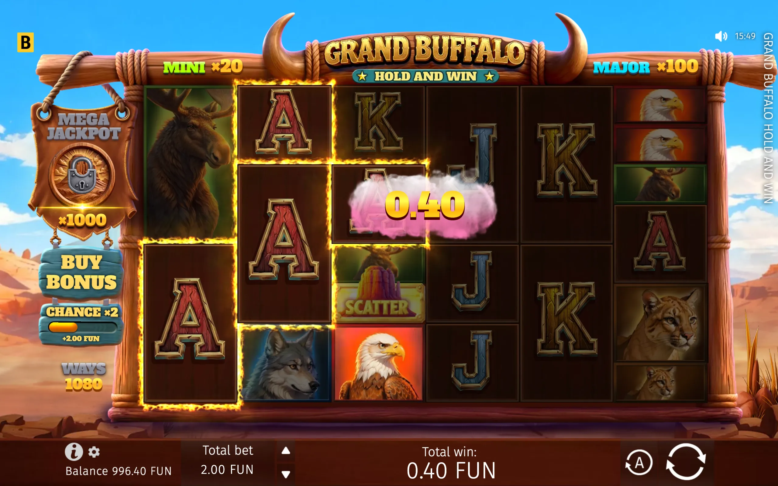 Grand Buffalo Hold & Win slot interface with buffalo, eagle, wolf, cougar, and moose symbols against a desert landscape, featuring jackpot multipliers and a 0.40 FUN win.