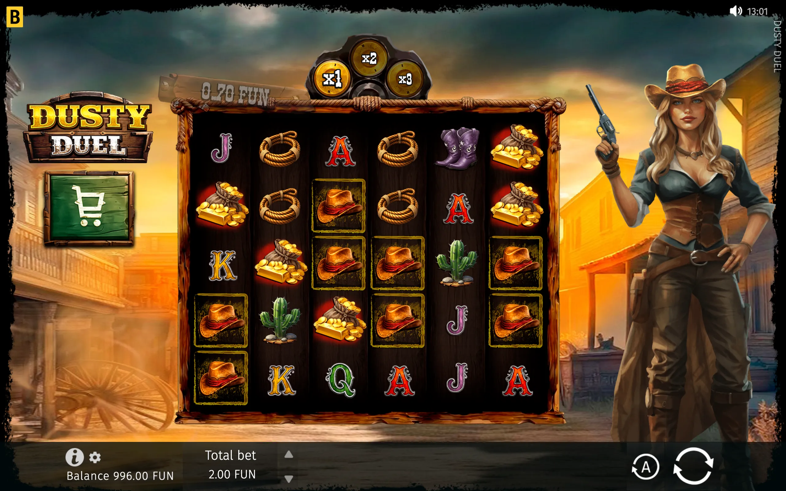 Dusty Duel western slot with a cowgirl holding a revolver beside a wooden reel frame filled with cowboy hats, gold bars, ropes, cacti, card symbols and x1, x2, x3 markers.