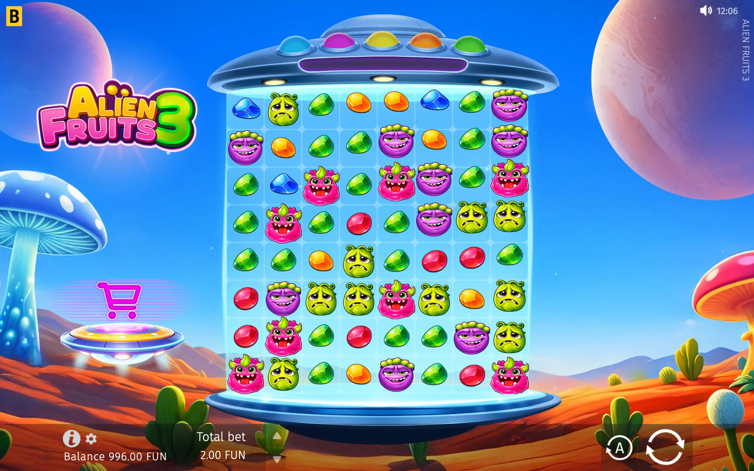 Alien Fruits 3 slot game with a cartoon UFO reel machine, colorful alien fruit symbols, jewel icons, and a desert planet landscape.