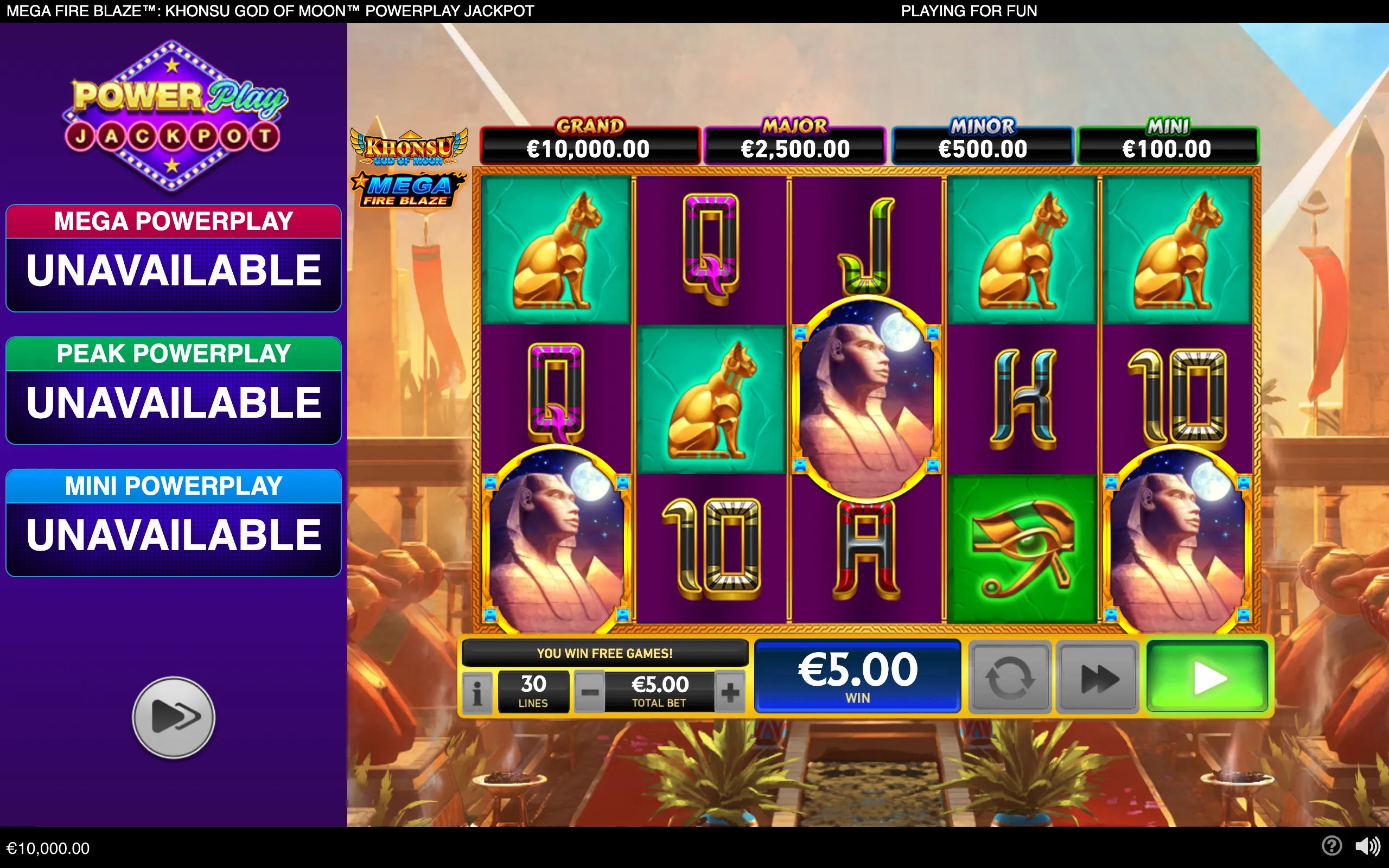Mega Fire Blaze Khonsu God of Moon PowerPlay Jackpot slot interface with Egyptian temple scenery, Khonsu symbols, golden cats, Egyptian lettering, jackpot meters, and a €5.00 win.