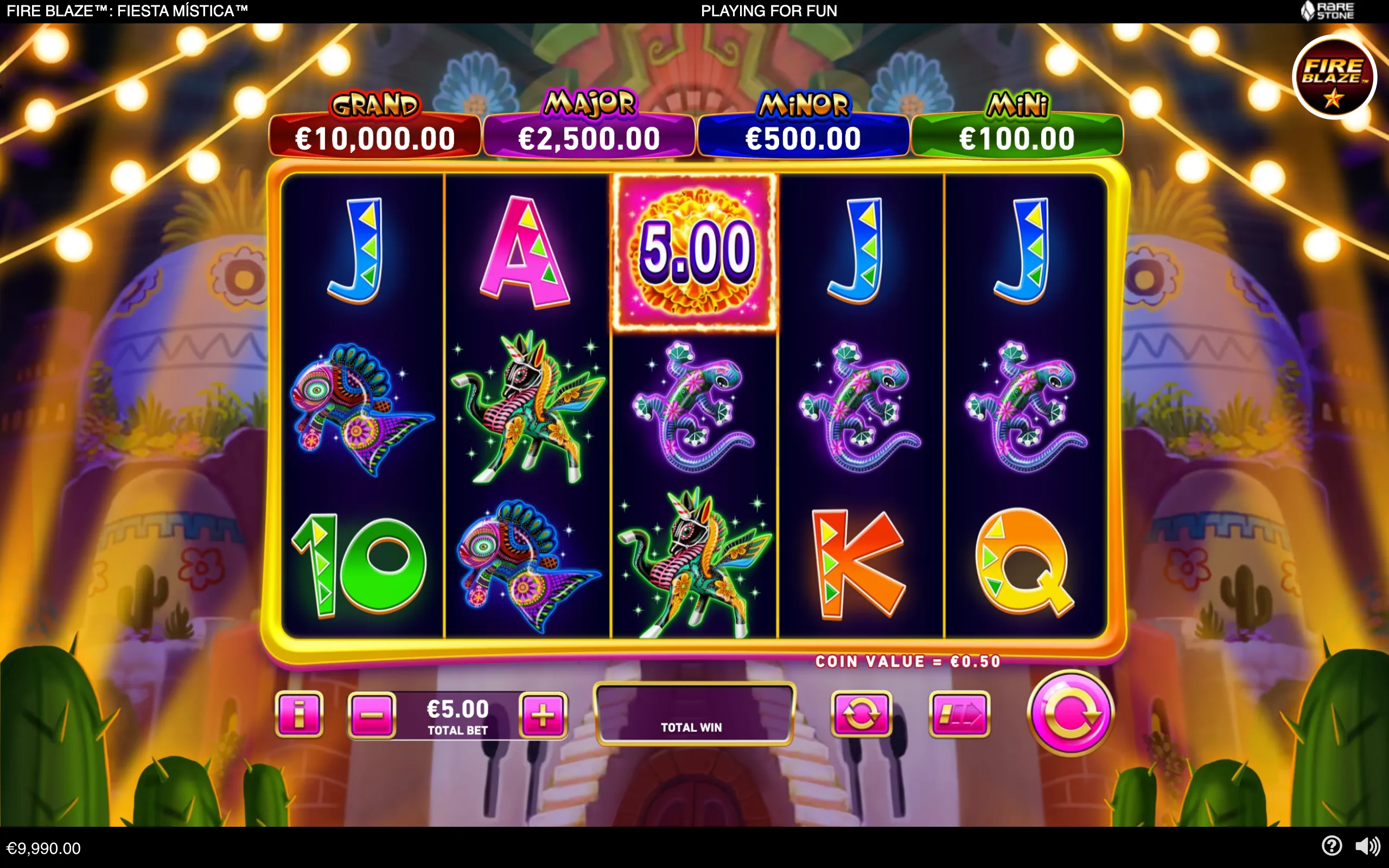 Fire Blaze Fiesta Mística slot reels display vibrant Mexican-inspired animal symbols, a glowing 5.00 coin symbol, and Grand, Major, Minor, and Mini jackpot values against a festive cactus-lined backdrop.
