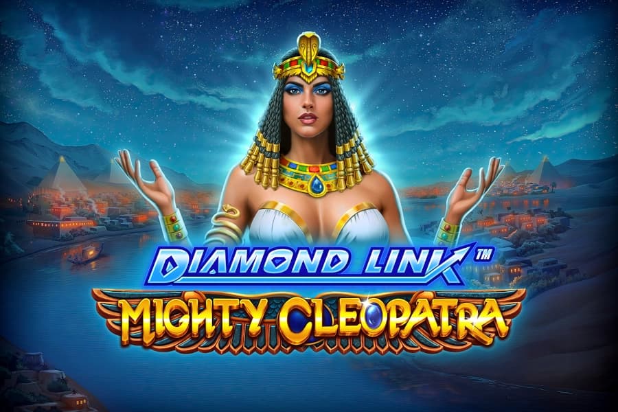 Cleopatra stands centered with raised hands, wearing Egyptian regalia, against a night-time desert backdrop with illuminated settlements and a river.