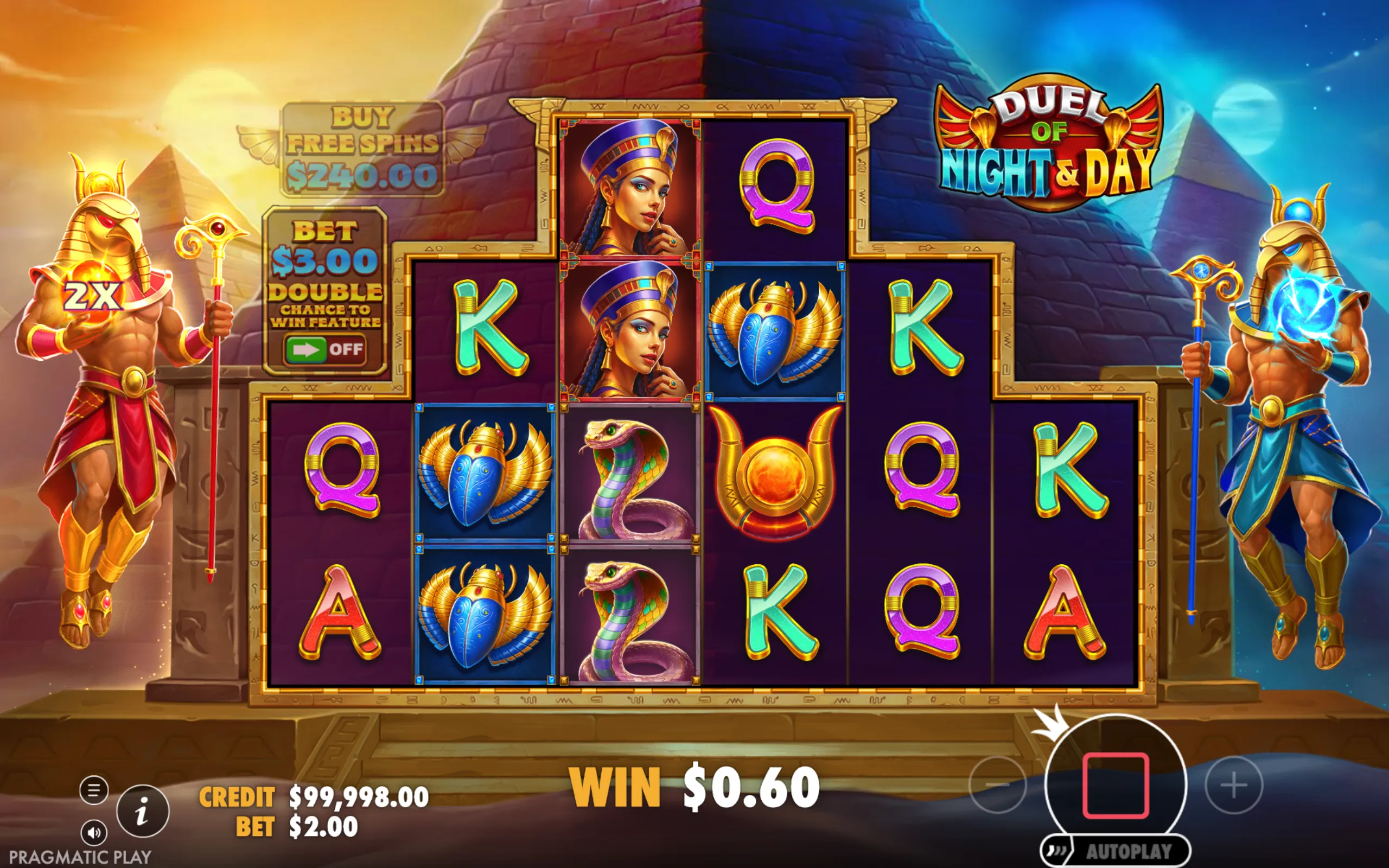 Slot game Duel of Night & Day with Egyptian-themed symbols and characters representing night and day, set against a backdrop of pyramids under sun and moon light.
