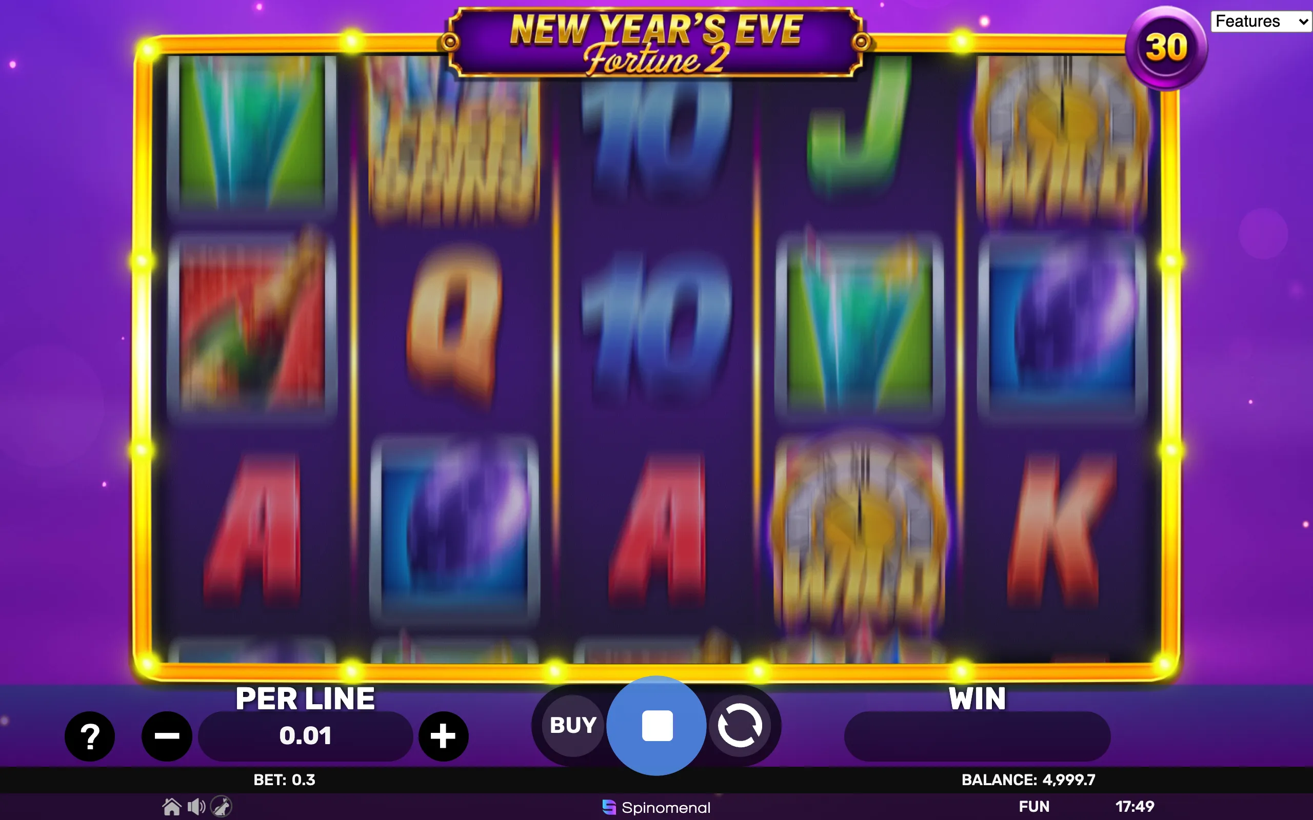 New Year's Eve Fortune 2 slot game with vibrant symbols including champagne glasses, wild clocks, and playing card icons on a purple background.