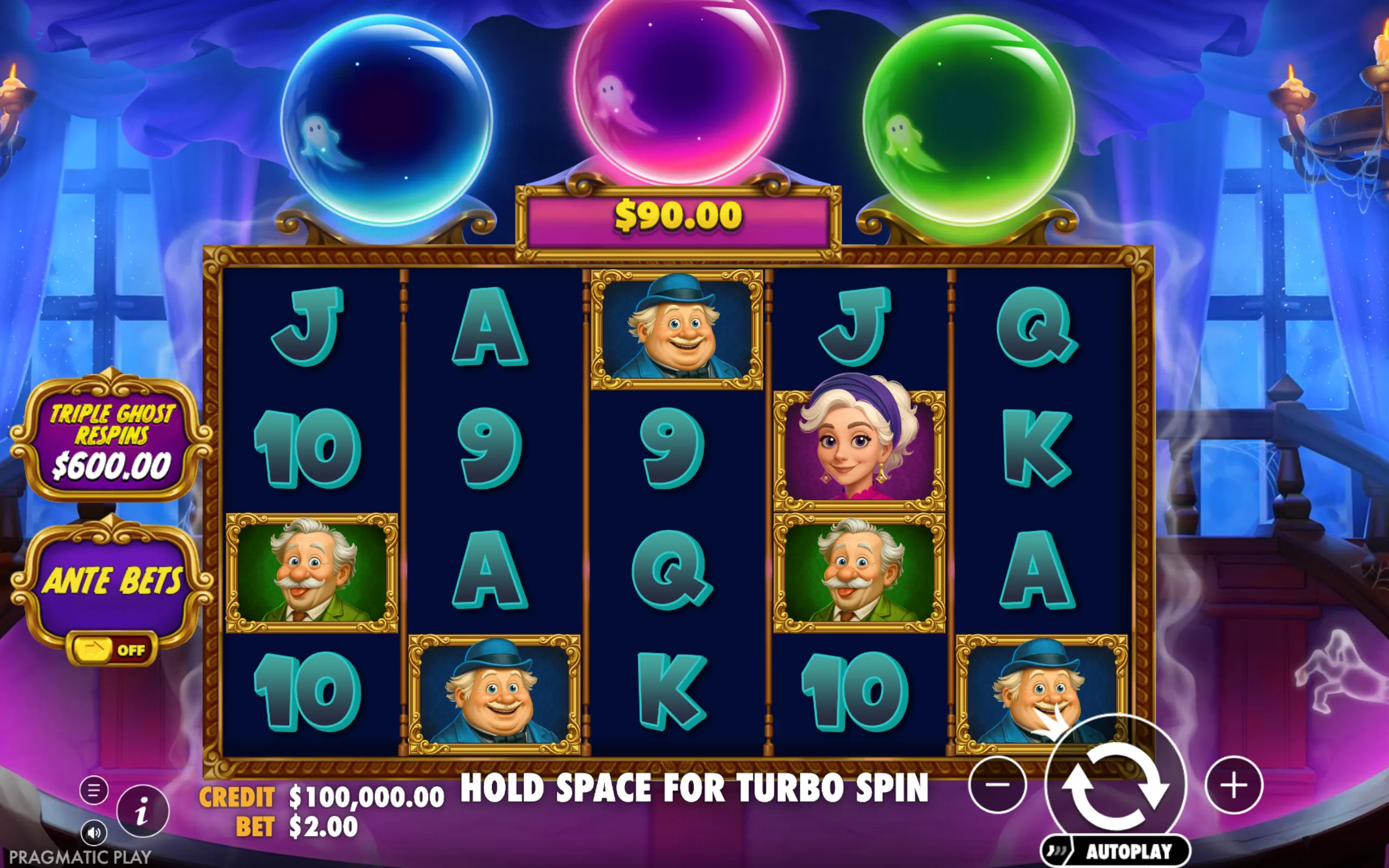 Colorful slot game interface featuring cartoonish ghost characters, crystal balls, and classic card symbols in a haunted mansion setting.