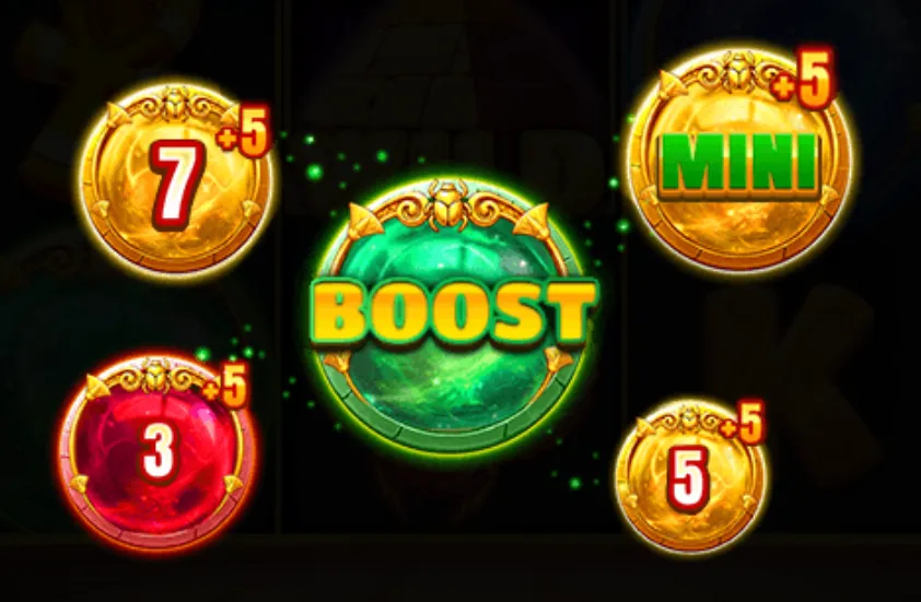 Golden and colored gem symbols with numbers and 'BOOST' text indicating bonus multipliers and jackpot tiers in an ancient Egyptian-themed slot game.