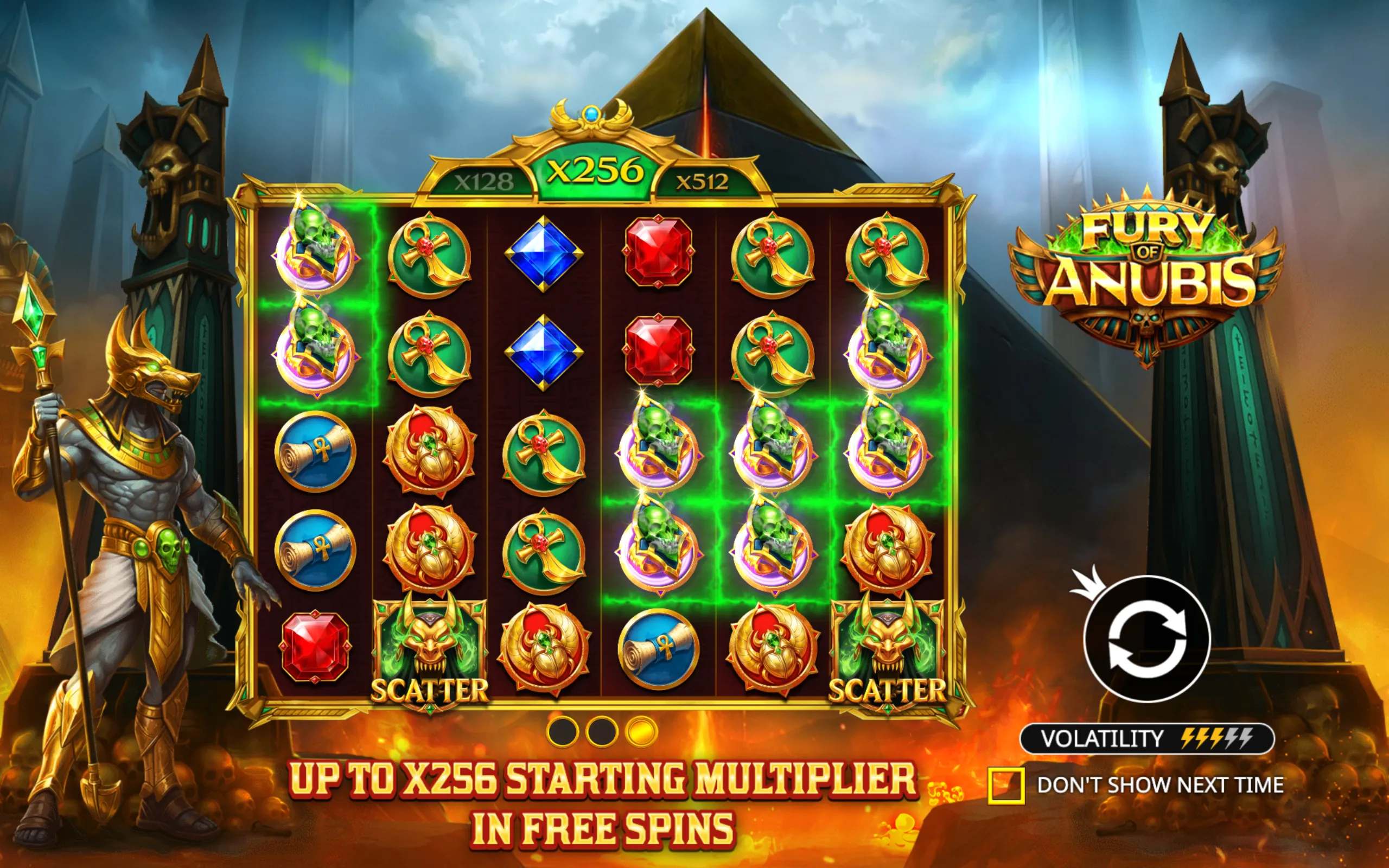 Slot game interface featuring Egyptian-themed symbols including skulls, daggers, gems, and scrolls, with a prominent Anubis character and a pyramid backdrop.