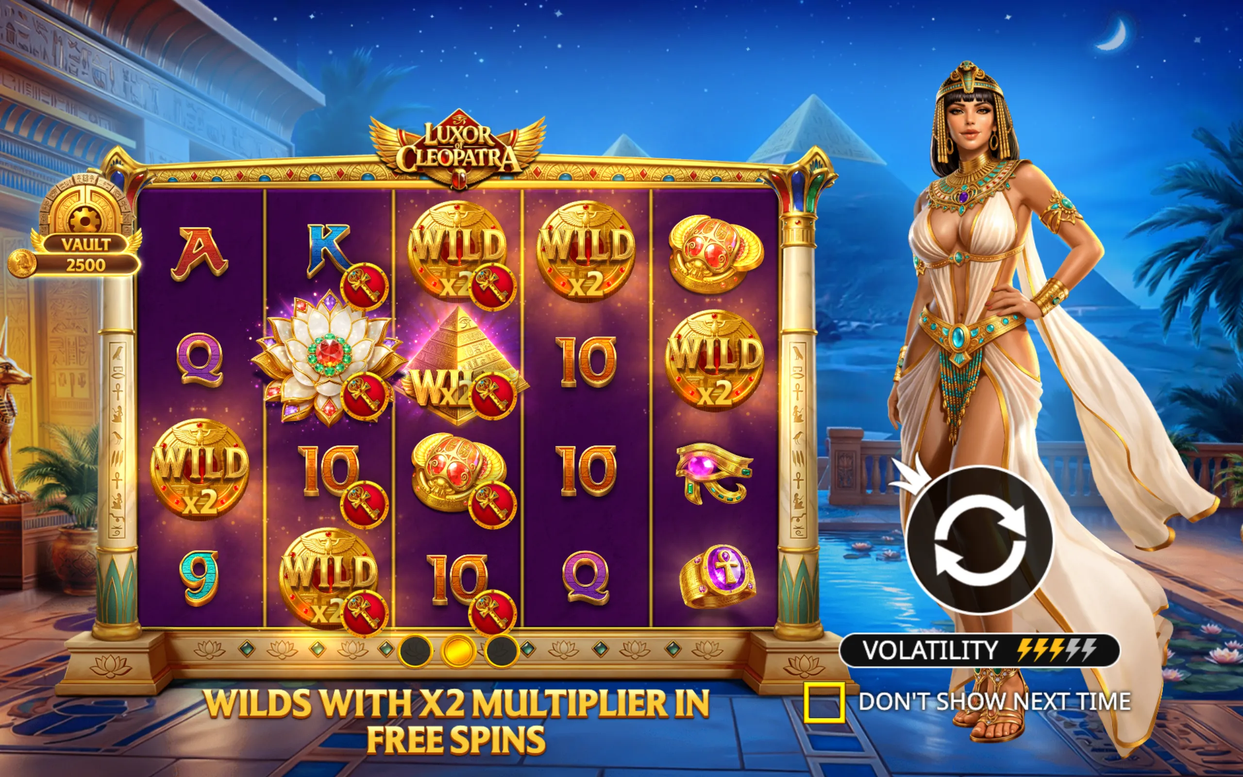 Luxor of Cleopatra slot game featuring Egyptian-themed symbols, Cleopatra character, and a night desert backdrop with pyramids under a crescent moon