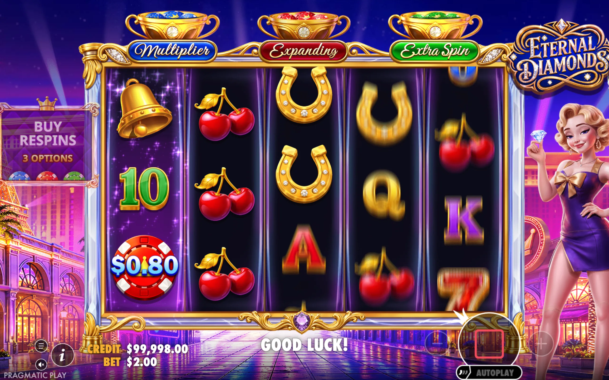 Eternal Diamonds slot game with golden symbols like bells, cherries, and horseshoes on a dark purple reel, featuring a glamorous female character holding a diamond and options for multiplier, expanding, and extra spin features.