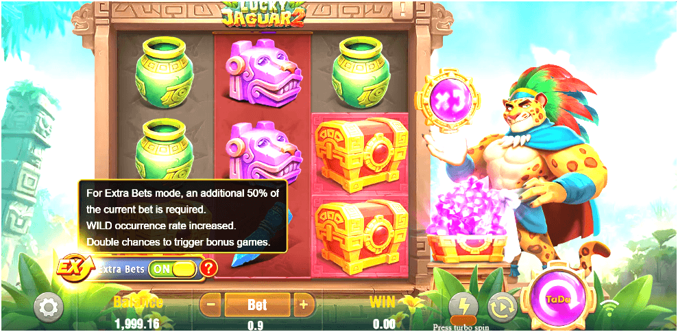 A slot game screen with reels displaying jars, masks, and chests; a tooltip explains Extra Bets benefits, while a jaguar warrior holds a glowing orb beside a gem-filled chest and the Extra Bets toggle is set to ON.