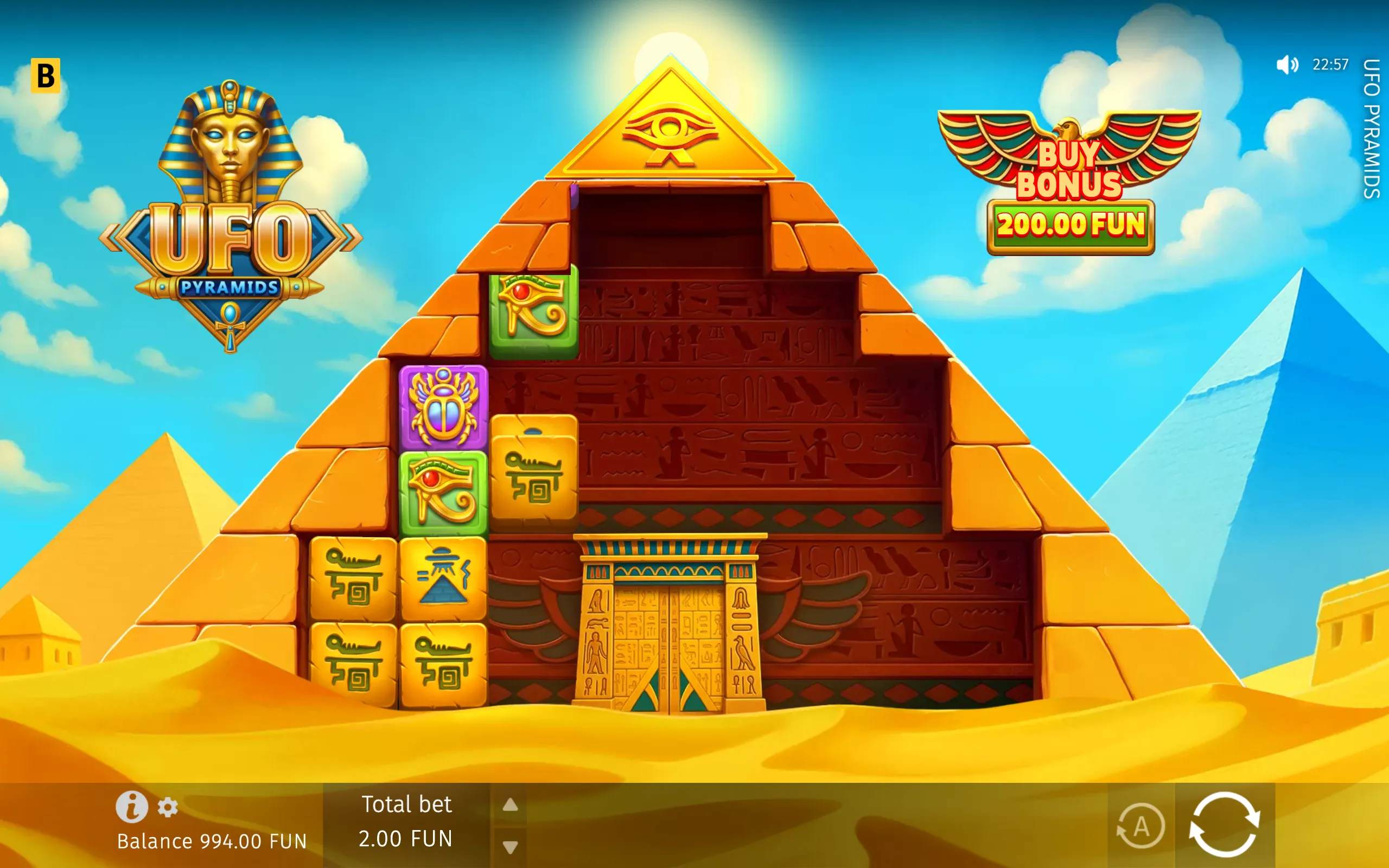 Colorful UFO Pyramids slot interface featuring an Egyptian pyramid, pharaoh mask, Eye of Horus, hieroglyphic symbols, desert sands, and a Buy Bonus option.