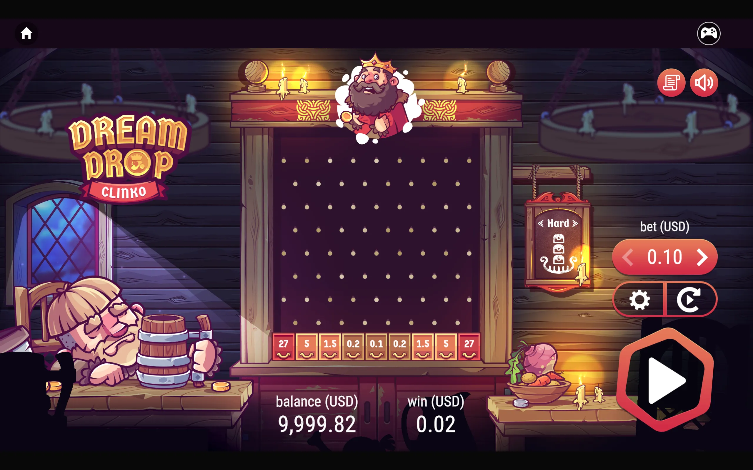 Dream Drop Clinko slot interface featuring a cartoon bearded king, a medieval tavern setting, and a central Clinko pegboard with payout values from 0.1 to 27.