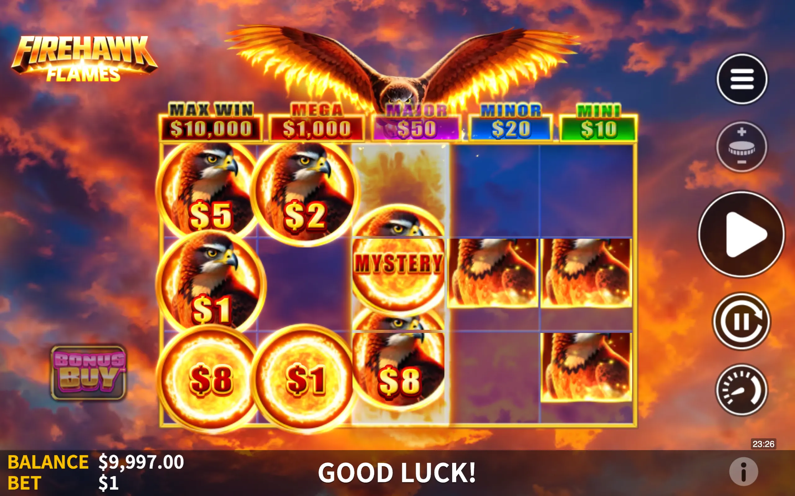 Firehawk Flames slot game interface featuring flaming hawk symbols, jackpot tiers, and a fiery sunset sky background