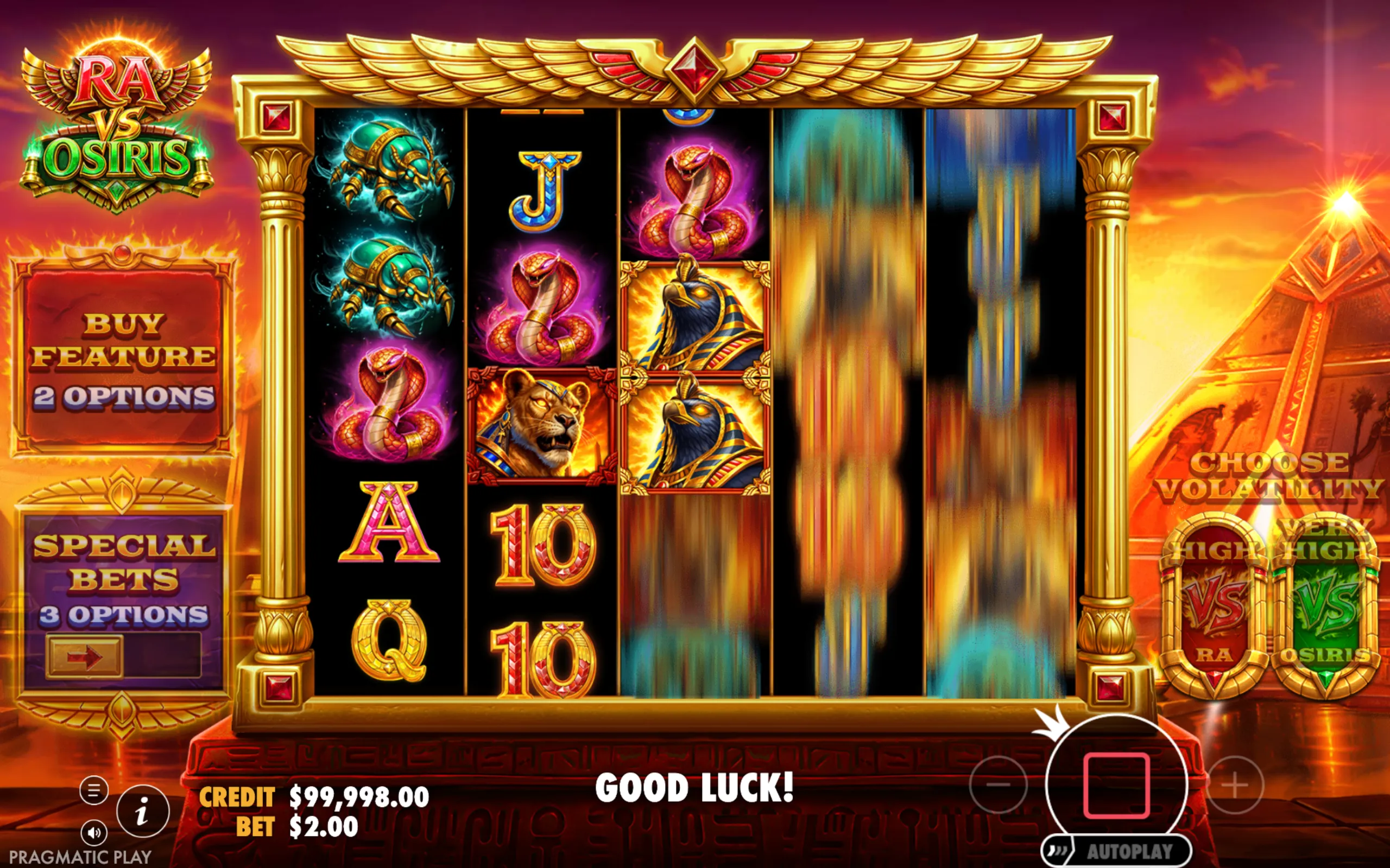 Slot game Ra vs Osiris features Egyptian-themed symbols including scarabs, cobras, and gods Ra and Osiris, set against a sunset backdrop with pyramids.